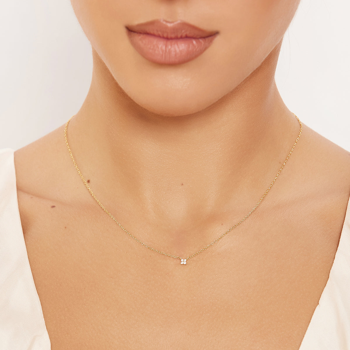 Iris clover white zirconia necklace plated in 14k gold