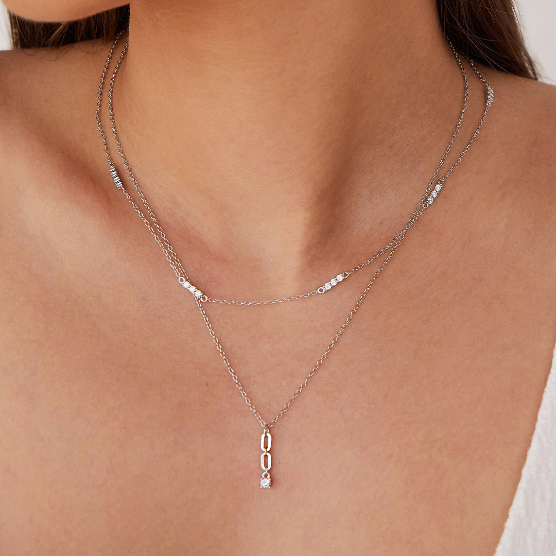 Jacinta Necklace with Zirconia Drop Pendant in Silver layered with Anthi Necklace